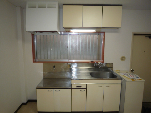 Kitchen. Kitchen there is a window.