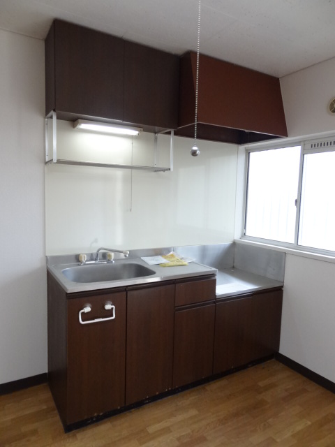 Kitchen. You can dishes in the bright kitchen has a window.