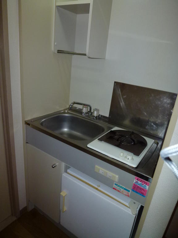 Kitchen. With bite gas stove