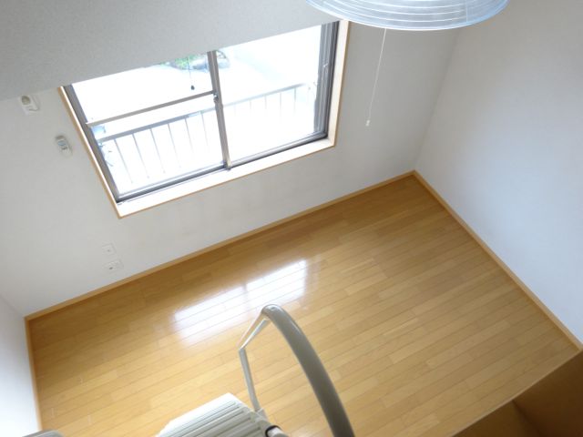 Living and room. Room viewed from the loft looks like.