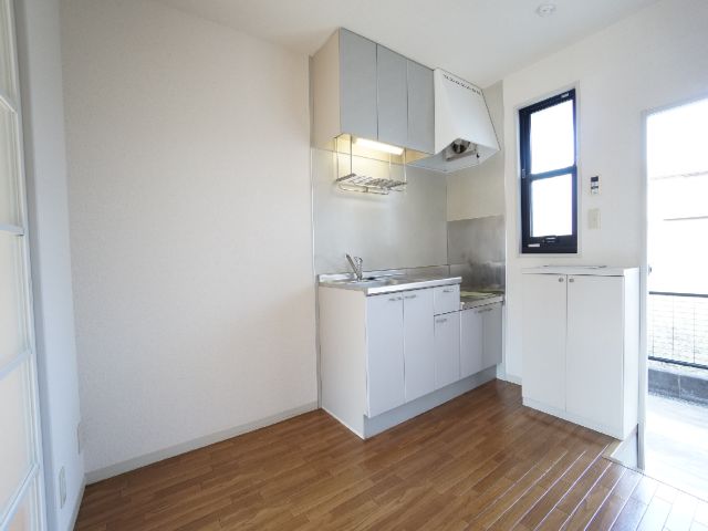 Kitchen. There are also windows in the kitchen.