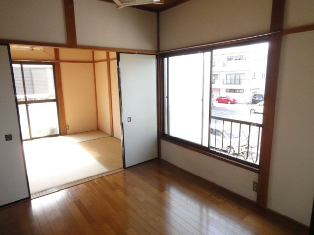 Living and room. Also it comes with a large window to the Western-style of the room