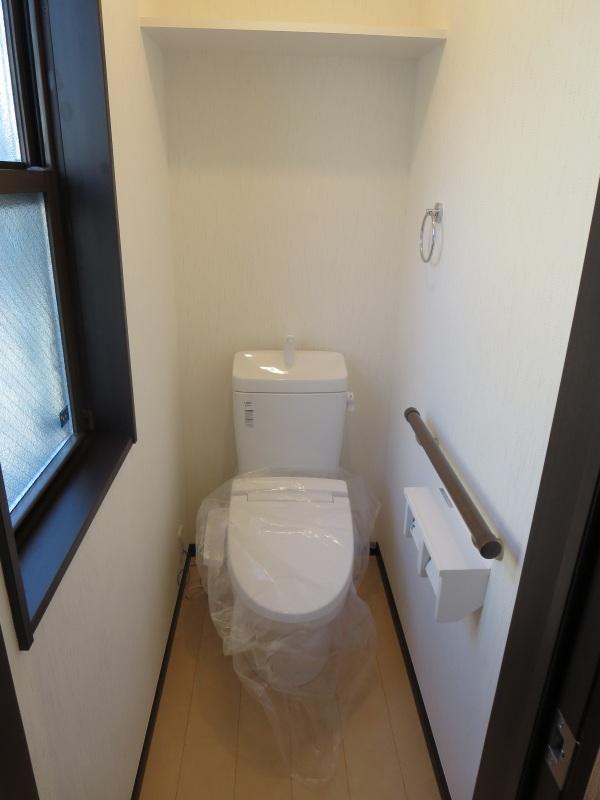 Toilet. Bright toilet with a window