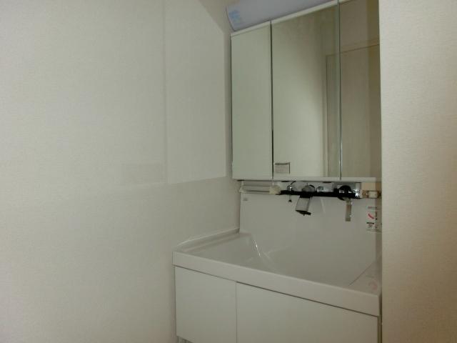 Wash basin, toilet. C Building