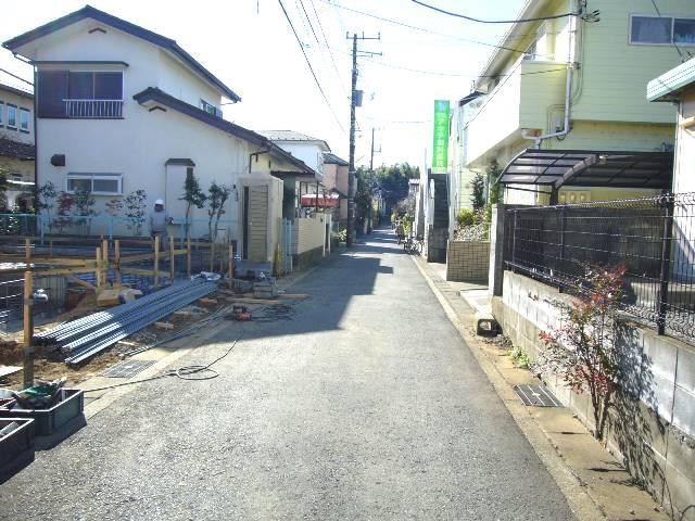 Local photos, including front road. Adjacent road (west 4m public road)