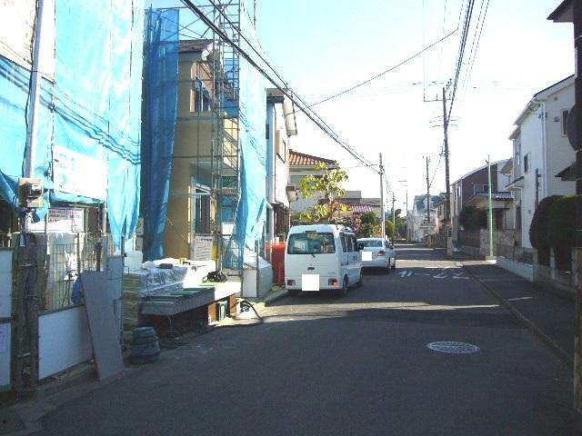 Local photos, including front road. Adjacent road (southwest side 6.7m public road)