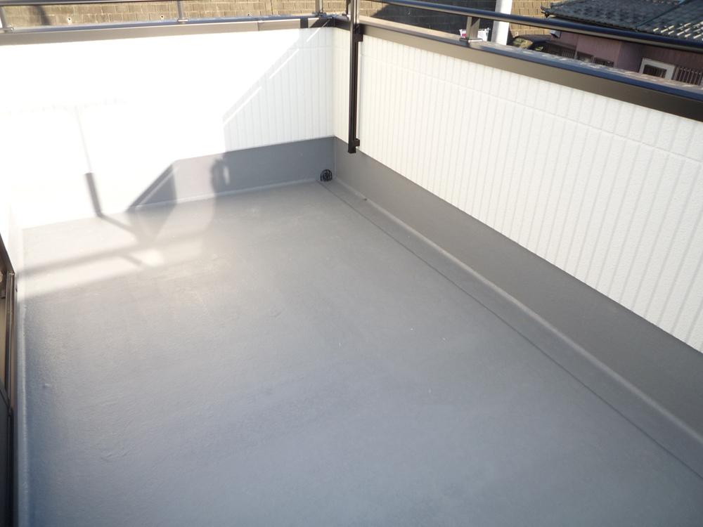 Balcony. It is a wide type of balcony.