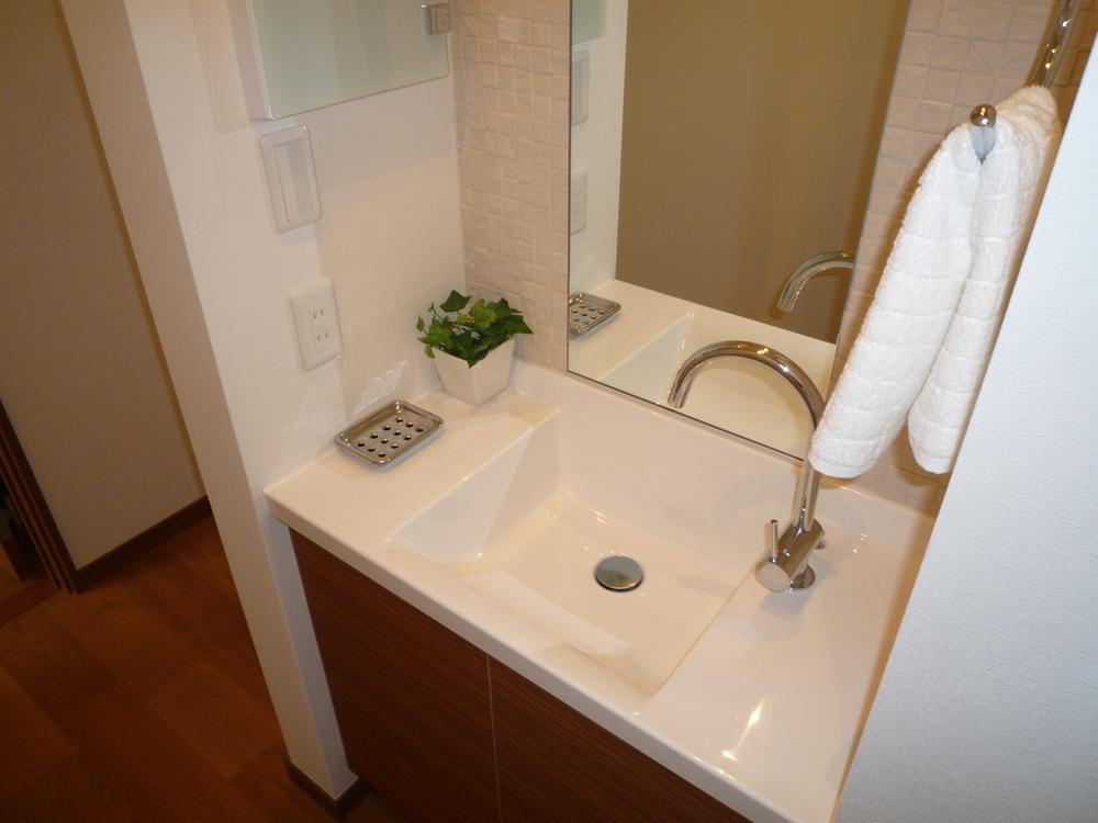 Wash basin, toilet. Also there is a wash basin on the second floor.