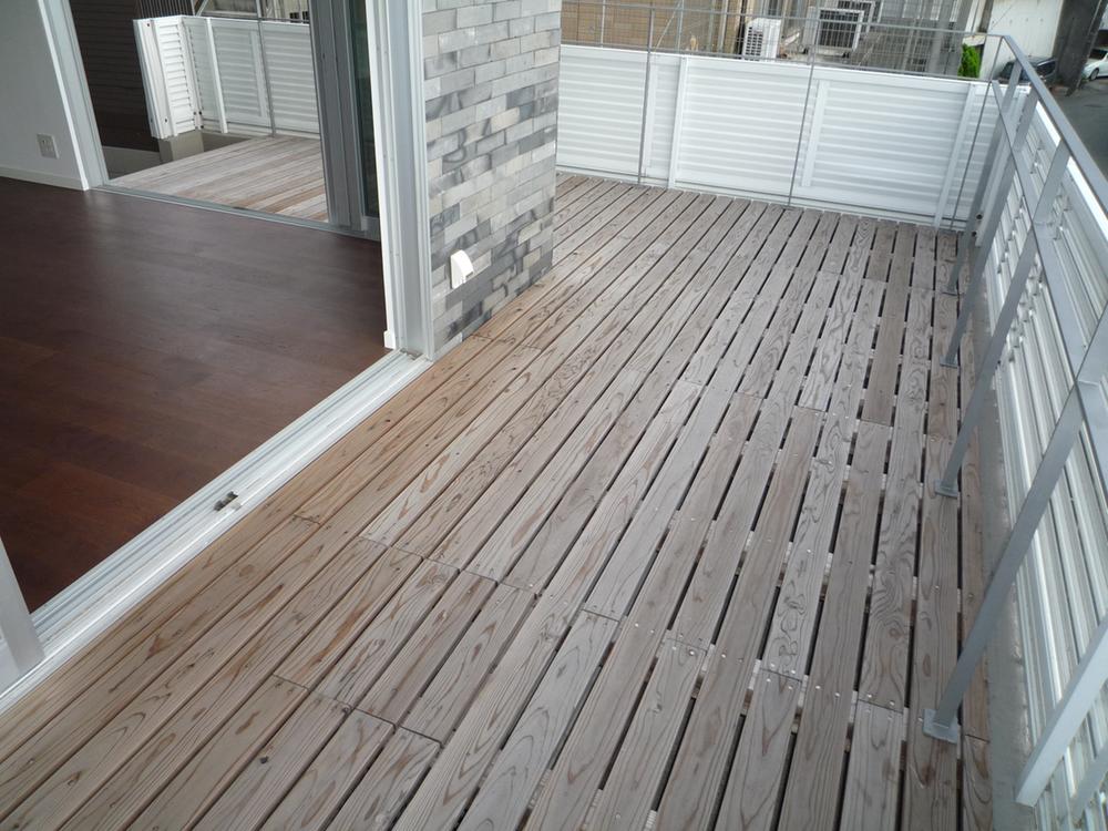 Other local. Is a wood deck that leads to the living southwest side dihedral.