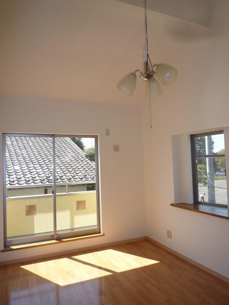 Non-living room. Room with a feeling of opening of the slope ceiling