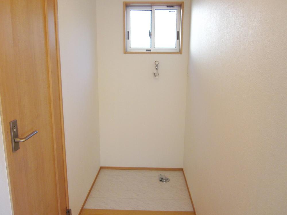 Wash basin, toilet. Washing machine Storage