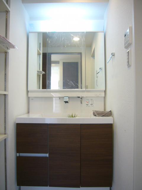Wash basin, toilet. Bathroom vanity