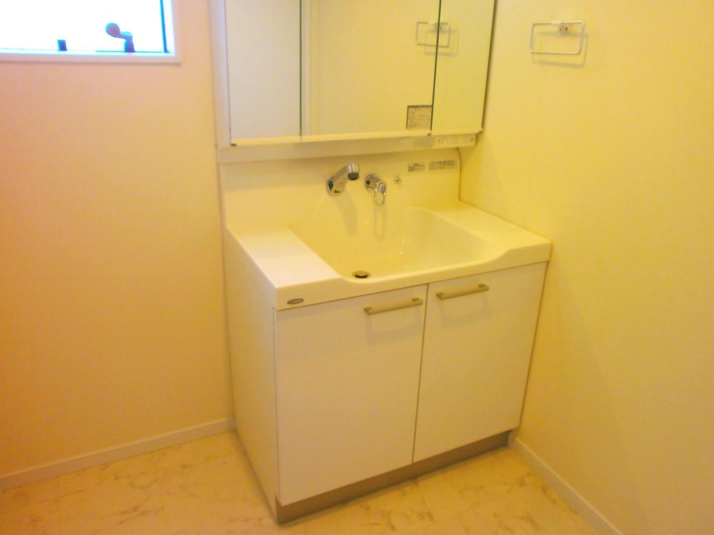 Wash basin, toilet. Bathroom vanity