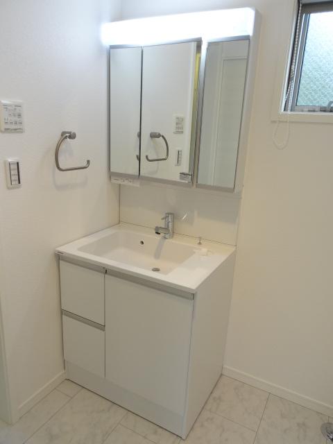 Wash basin, toilet. Bathroom vanity