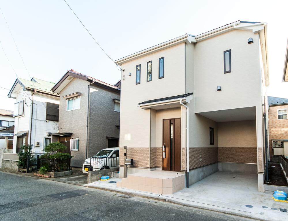 Local appearance photo. New 2-story house