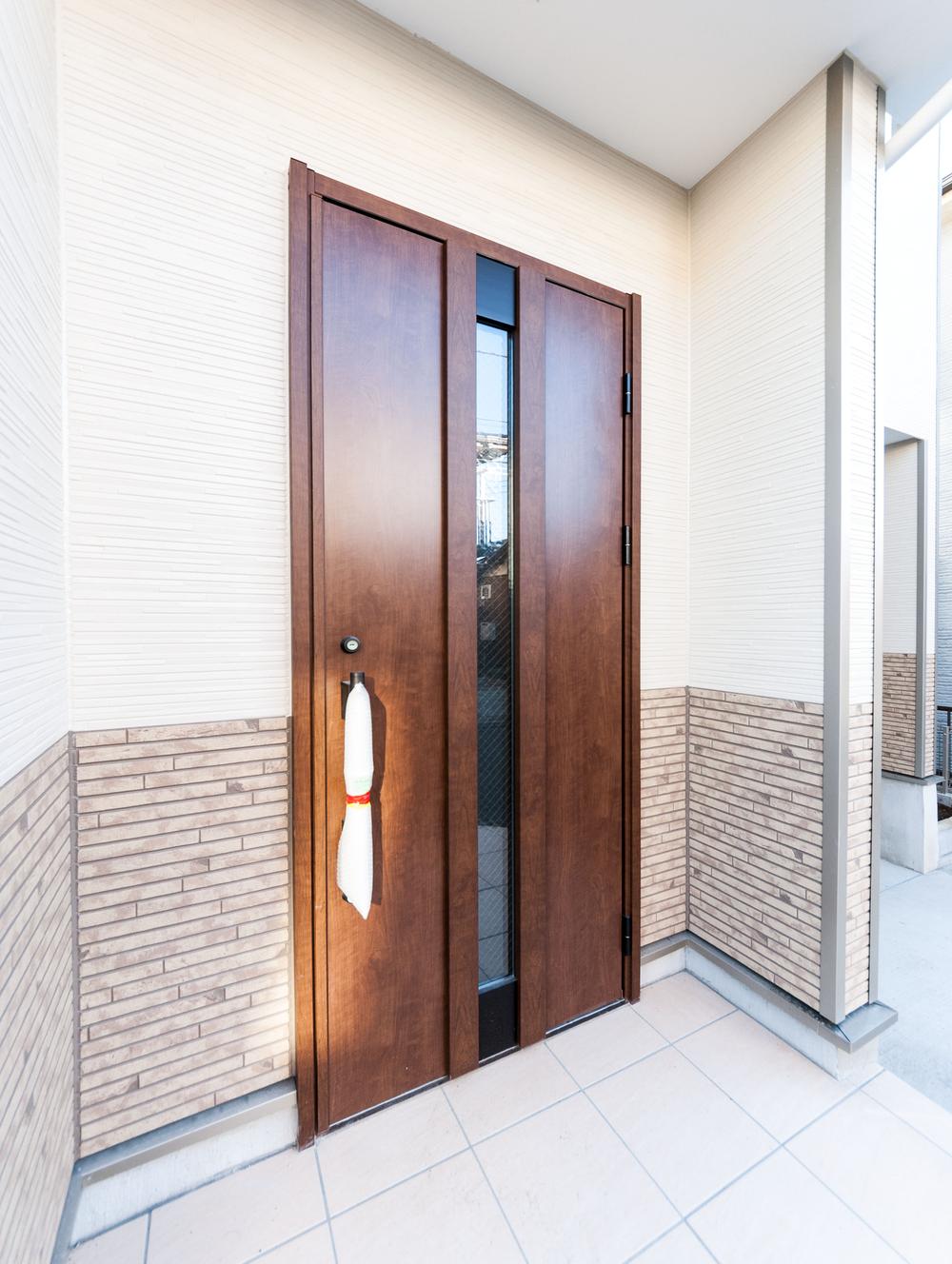 Entrance. Dignified entrance door of the design