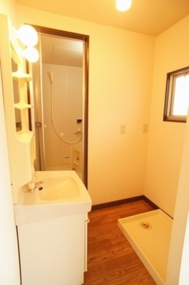 Washroom. There is a washing machine yard in washroom!