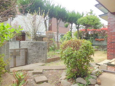 Entrance. Private garden