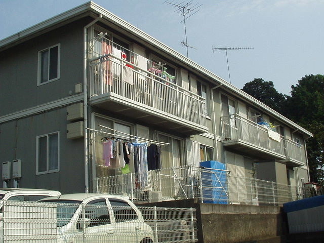 Building appearance. Spacious balcony