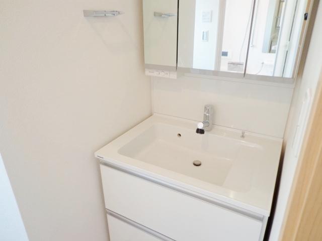 Wash basin, toilet. Bathroom vanity