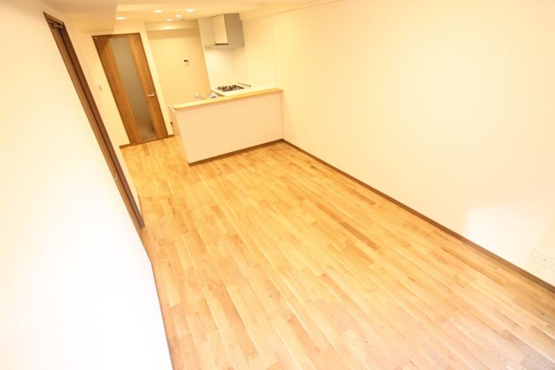 Living. Adopt a natural solid wood flooring