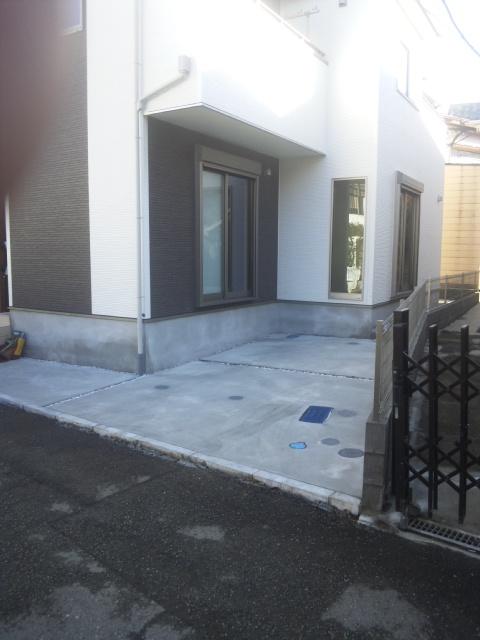 Parking lot. There are car spaces. 