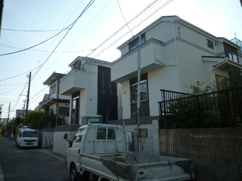 Local appearance photo. Newly built condominiums [All two buildings] 