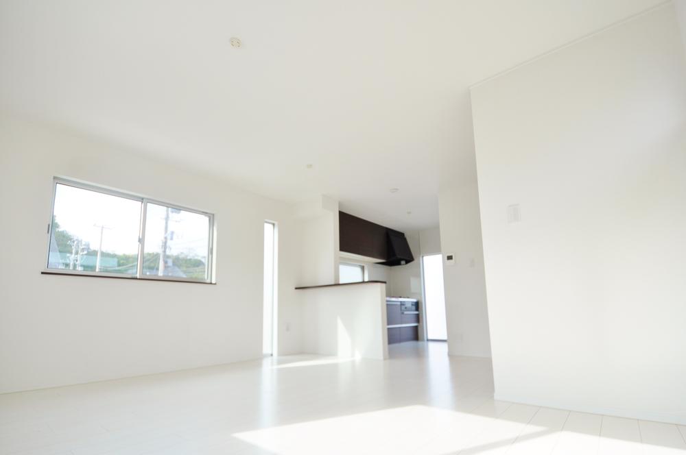 Living. Local 1 Building Living. Families gather living is bathed in sunlight.