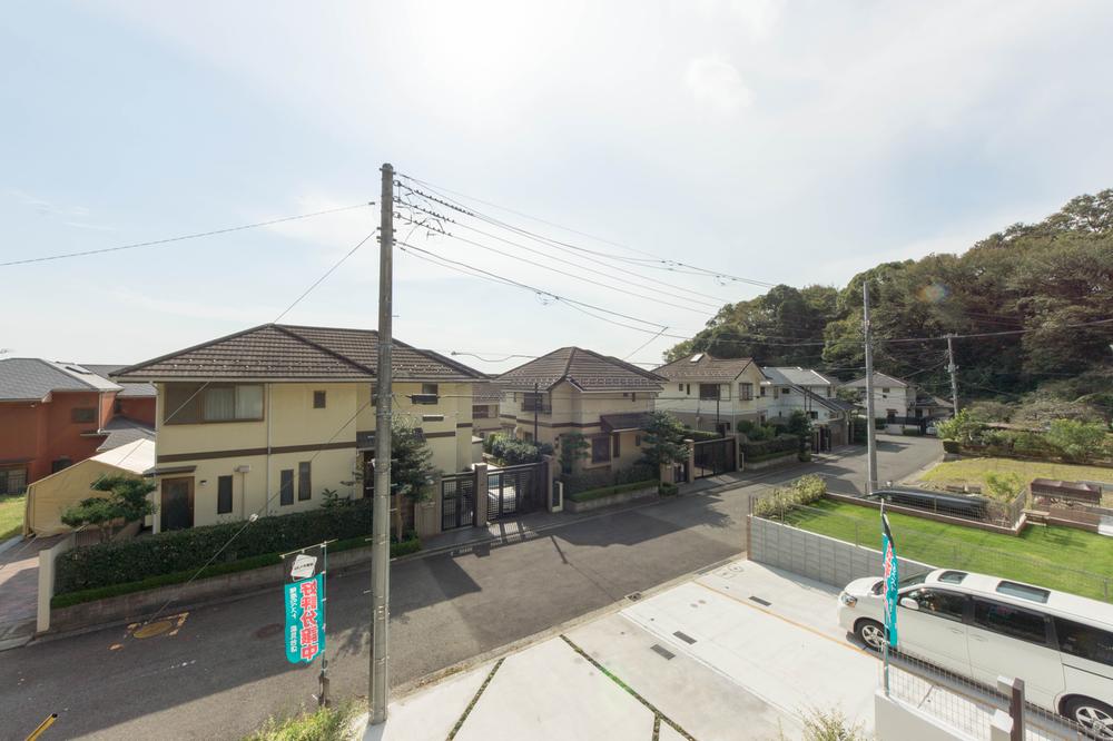 View photos from the dwelling unit. The view from the second floor of the building, Around the quiet residential area