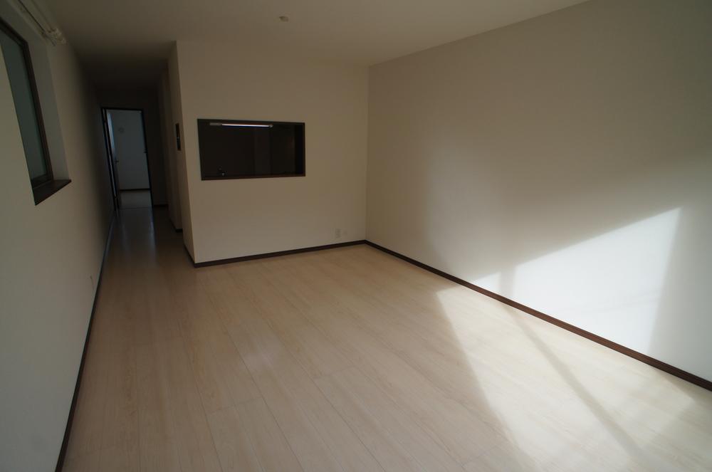 Living. Shoot the kitchen direction from the balcony side.