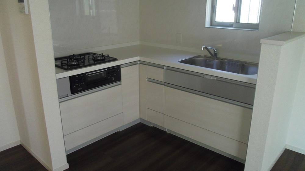 Kitchen. Bright and a clean kitchen bathed in sunlight from the window