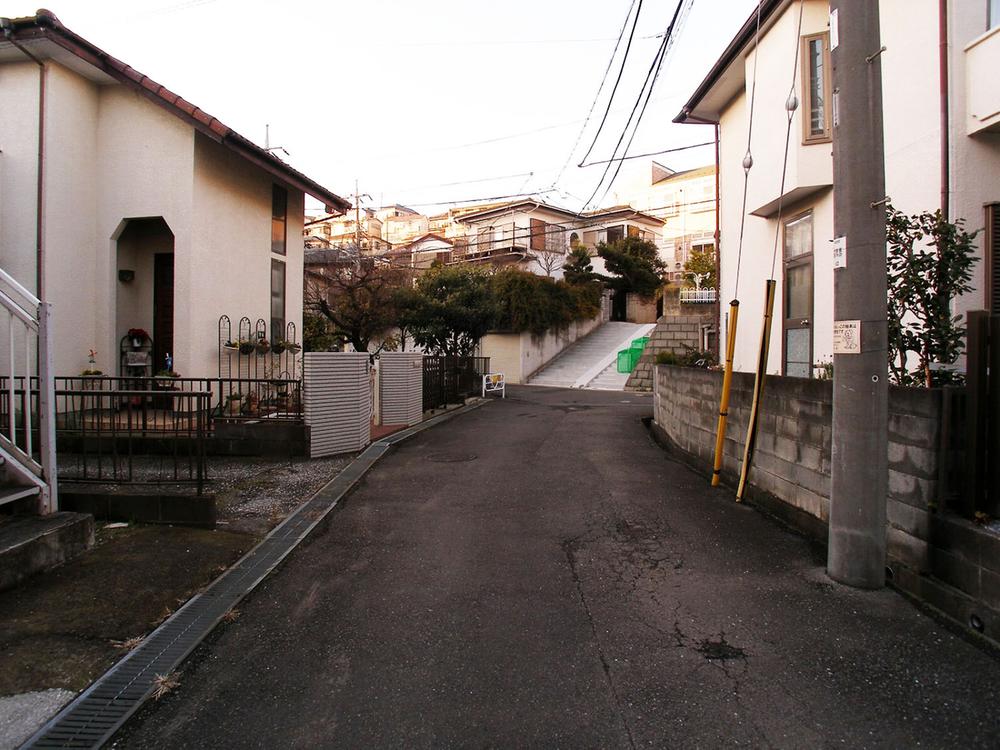 Local photos, including front road. It is near a quiet residential area