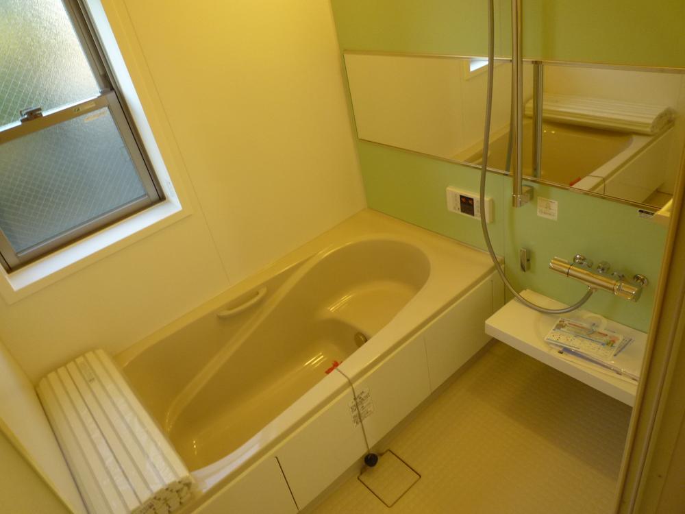 Bathroom. Adopt a unit bus up a notch by wide mirror. 