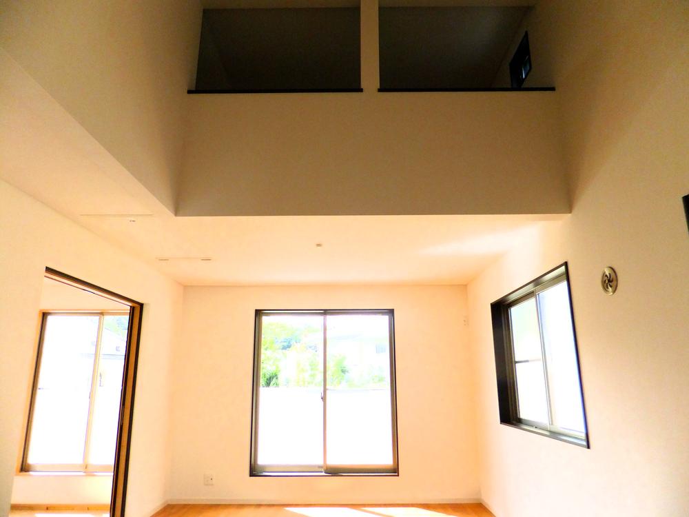 Living. Second floor living room, There is a very open feeling with a gradient ceiling.