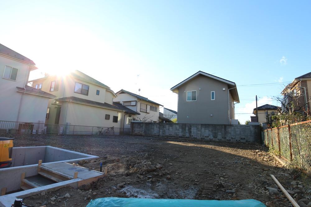 Local photos, including front road. It is a vacant lot photo of before construction!