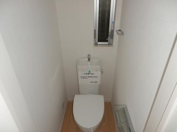 Toilet. It is a photograph of the toilet