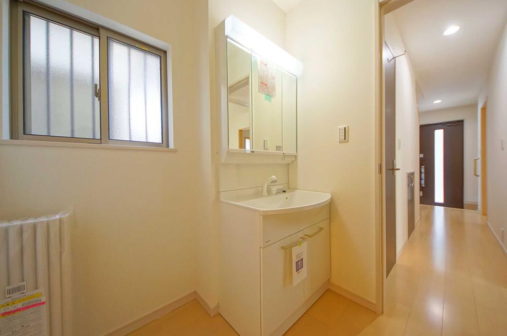 Wash basin, toilet. Indoor (September 2013) Shooting, It is a fan face vanity with storage capacity.