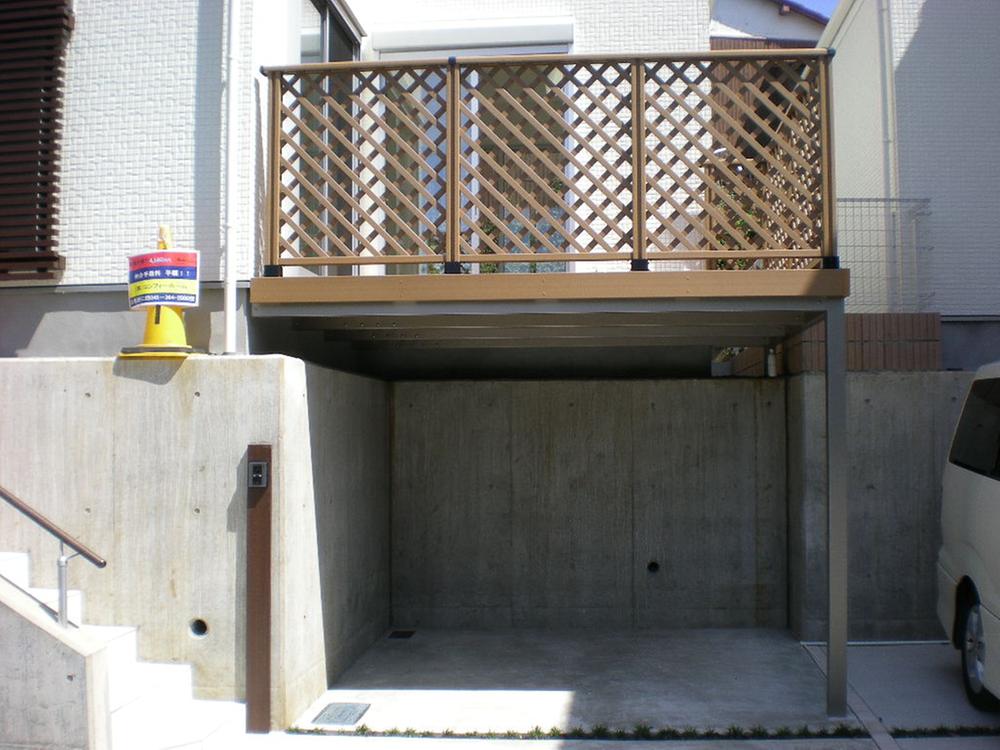 Parking lot. Car space is beyond the effective height two meters since the high-roof car is OK, too.