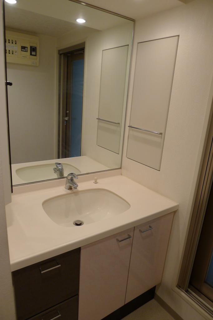 Wash basin, toilet. Washroom is also excellent ventilation with windows.