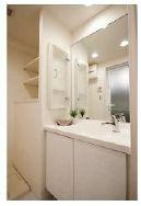 Wash basin, toilet. Is a wash room.