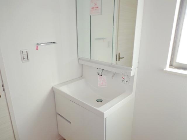 Wash basin, toilet. Bathroom vanity