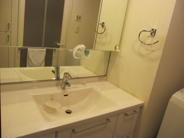 Wash basin, toilet. Bathroom vanity