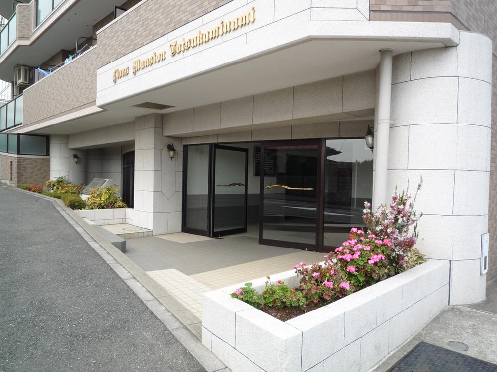 Entrance. Entrance surrounded by planting (2013 May shooting)