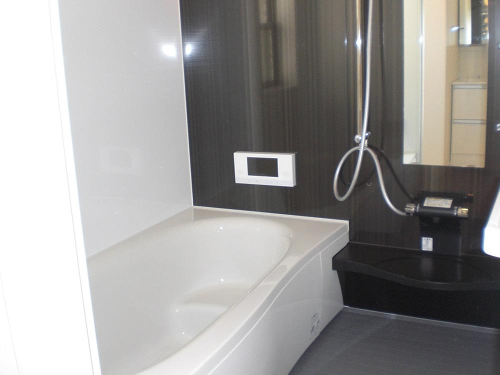 Bathroom. With a TV in the bathroom