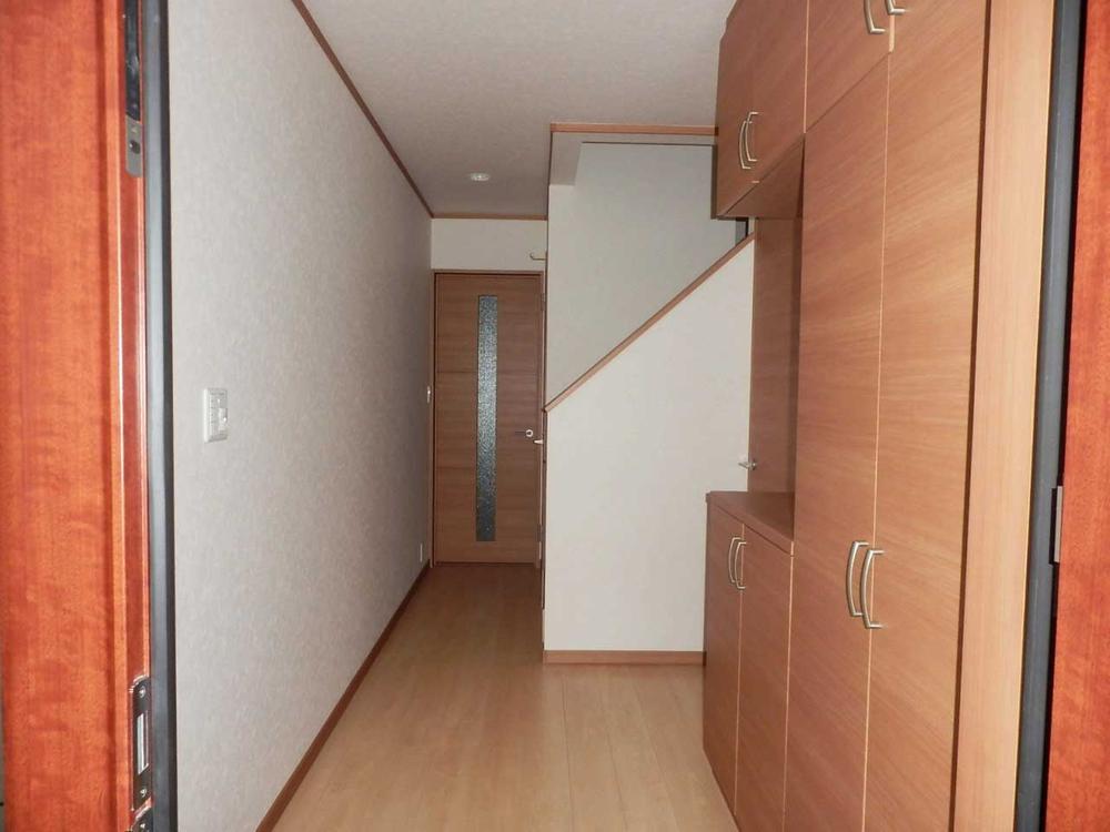 Entrance. It is storage space rich entrance with a cabinet!