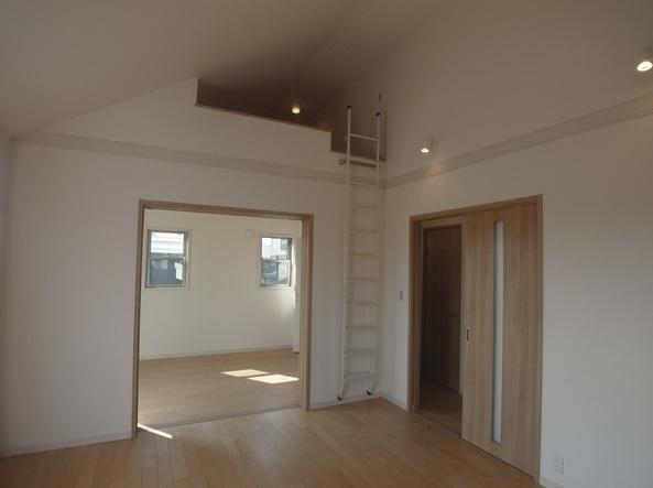 Living. There is also attic storage!