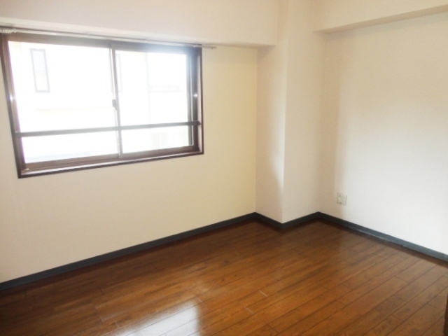 Other room space. The living room is a picture