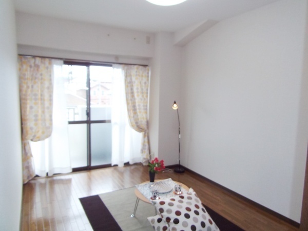 Other room space. The living room is a picture