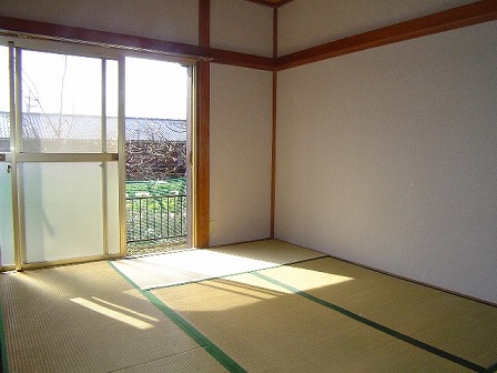 Toilet. It is a photograph of the same type separate room. 