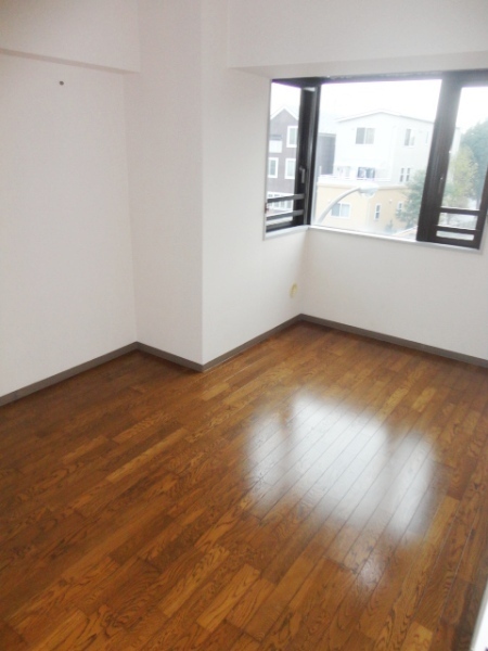 Other room space. The living room is a picture